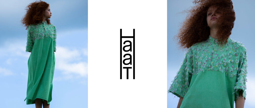 Three sections. Left: Model wearing HOPPING COTTON short-sleeved midi dress in green standing with arms behind back and looking to the left. Background of blue sky with clouds. Shot from ankles up. Middle: HaaT logo in black on white background. Right: Model wearing HOPPING COTTON short-sleeved midi dress in green standing with arms behind back and looking to the right. Background of blue sky with clouds. Shot from waist up.