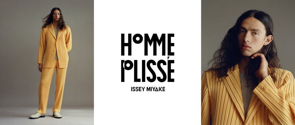 Left: Model wearing BOX PLEATS ENSEMBLE Jacket and trousers in melon orange with white loafers. Grey background. Centre: HOMME PLISSÉ ISSEY MIYAKE logo in black on white background. Right: Model in the melon orange suit, shot from elbows up, holding their left hand under their chin.