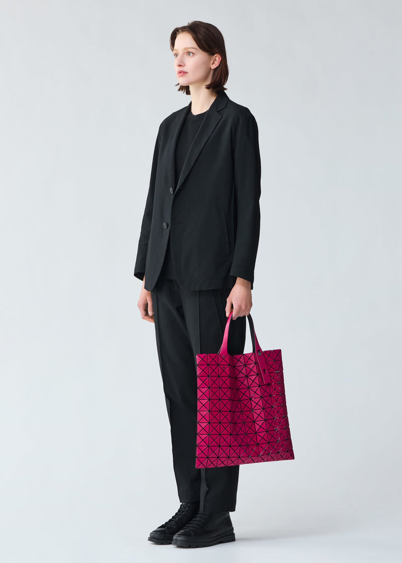 A model wears the BAO BAO ISSEY MIYAKE PRISM MATTE 2 tote.