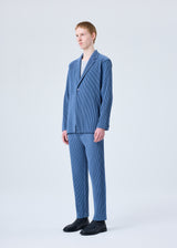 A model wears the HOMME PLISSÉ ISSEY MIYAKE TAILORED PLEATS 1 jacket