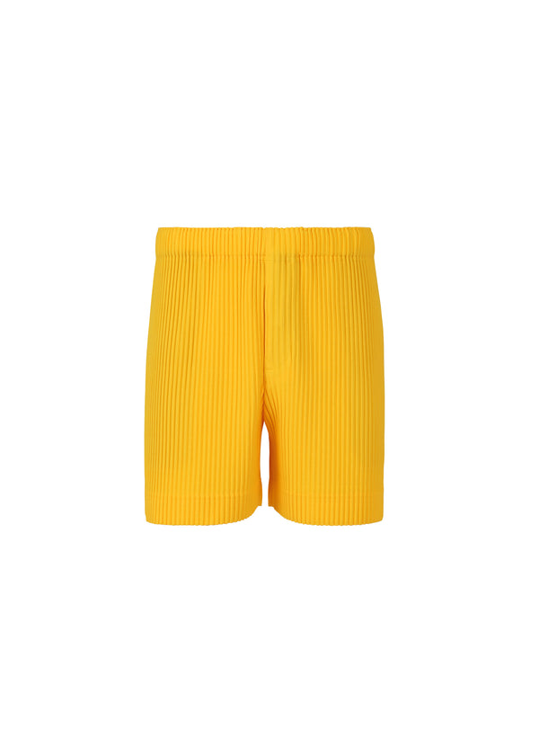 A product shot of the HOMME PLISSÉ ISSEY MIYAKE  MC JULY shorts in yellow (52)