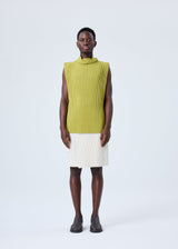 A model wears the HOMME PLISSÉ ISSEY MIYAKE PLEATS BOTTOMS 2 trousers.