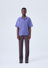 A model wears the HOMME PLISSÉ ISSEY MIYAKE  MC JULY shirt