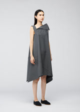 A model wears the 132 5. ISSEY MIYAKE  FRACTAL SOLID dress