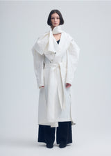 A model wears the ISSEY MIYAKE  ENCLOTHE coat