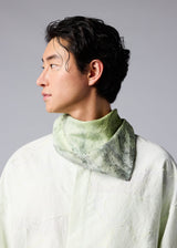 A model wears the IM MEN SOIL SCARF stole.