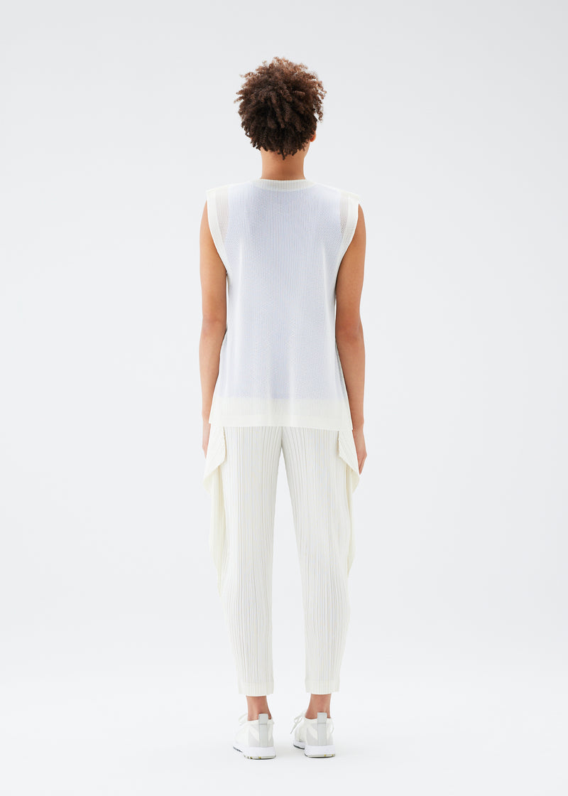 A model wears the PLEATS PLEASE ISSEY MIYAKE  TATAMI JULY top