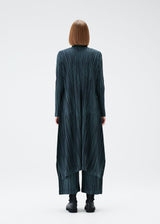 A model wears the PLEATS PLEASE ISSEY MIYAKE METEOR SHOWER coat.