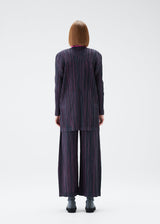 A model wears the PLEATS PLEASE ISSEY MIYAKE METEOR SHOWER jacket.