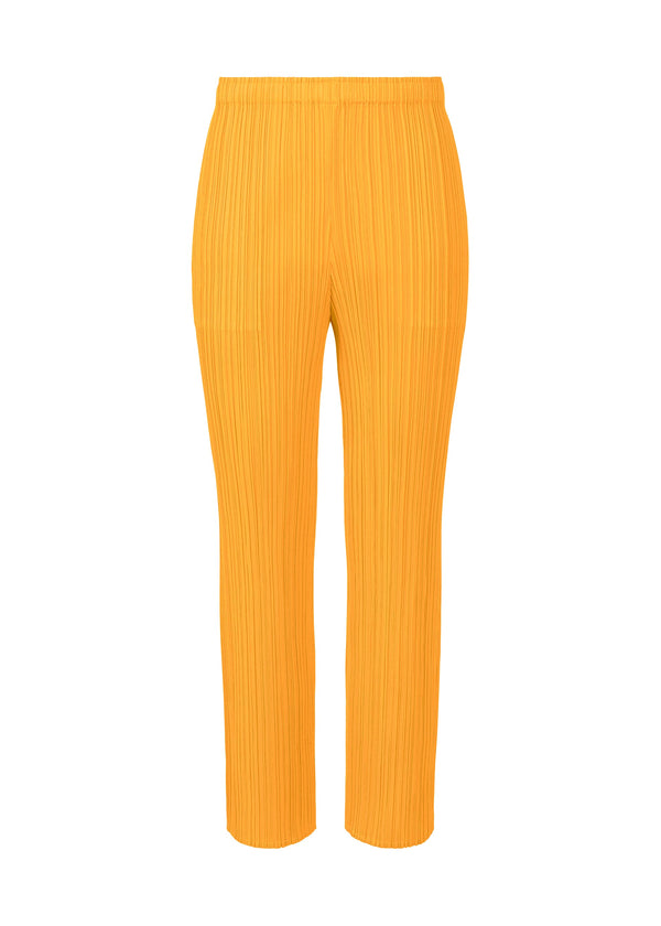 A product shot of the PLEATS PLEASE ISSEY MIYAKE MONTHLY COLORS OCTOBER trousers in yellow (52).