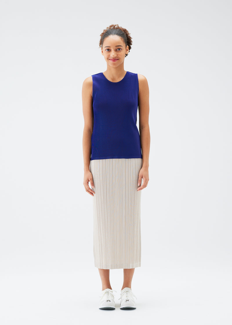 A model wears the PLEATS PLEASE ISSEY MIYAKE  THICKER BOTTOMS 1 skirt