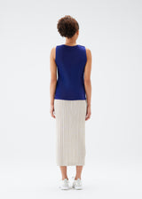 A model wears the PLEATS PLEASE ISSEY MIYAKE  THICKER BOTTOMS 1 skirt