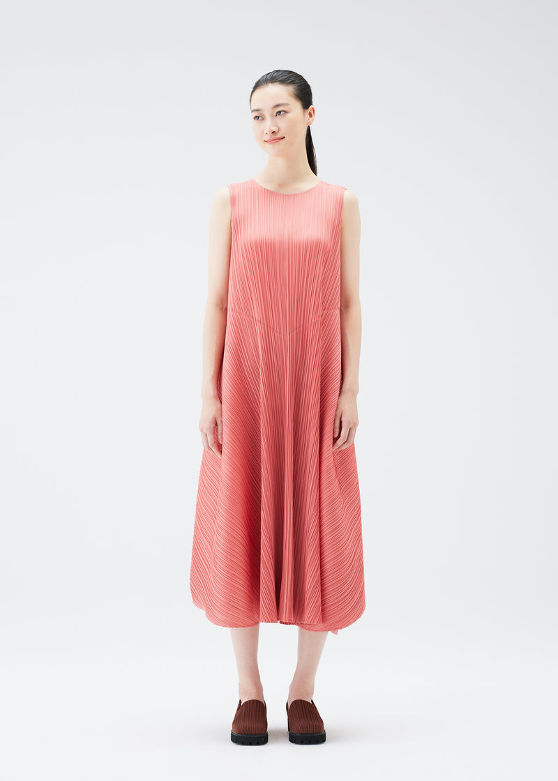 A model wears the PLEATS PLEASE ISSEY MIYAKE  SOLAR FLARE dress