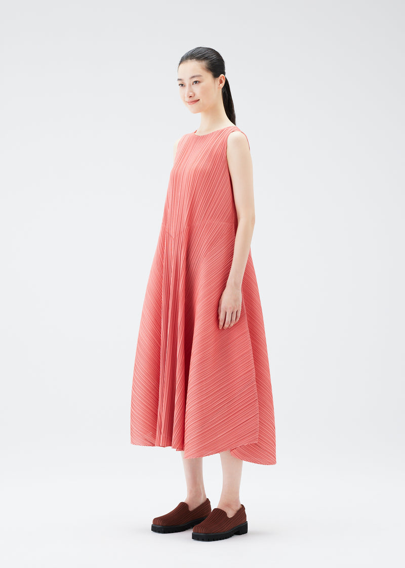 A model wears the PLEATS PLEASE ISSEY MIYAKE  SOLAR FLARE dress