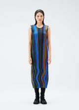 A model wears the PLEATS PLEASE ISSEY MIYAKE WARP dress.