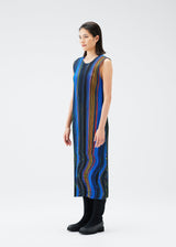 A model wears the PLEATS PLEASE ISSEY MIYAKE WARP dress.