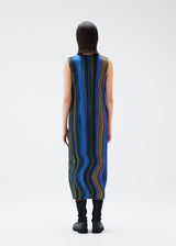 A model wears the PLEATS PLEASE ISSEY MIYAKE WARP dress.