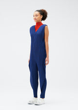 A model wears the PLEATS PLEASE ISSEY MIYAKE  THICKER BOTTOMS 1 jumpsuit