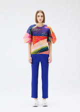 A model wears the PLEATS PLEASE ISSEY MIYAKE  VOYAGER top