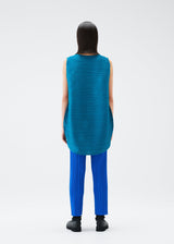 A model wears the PLEATS PLEASE ISSEY MIYAKE ORBIT tunic.