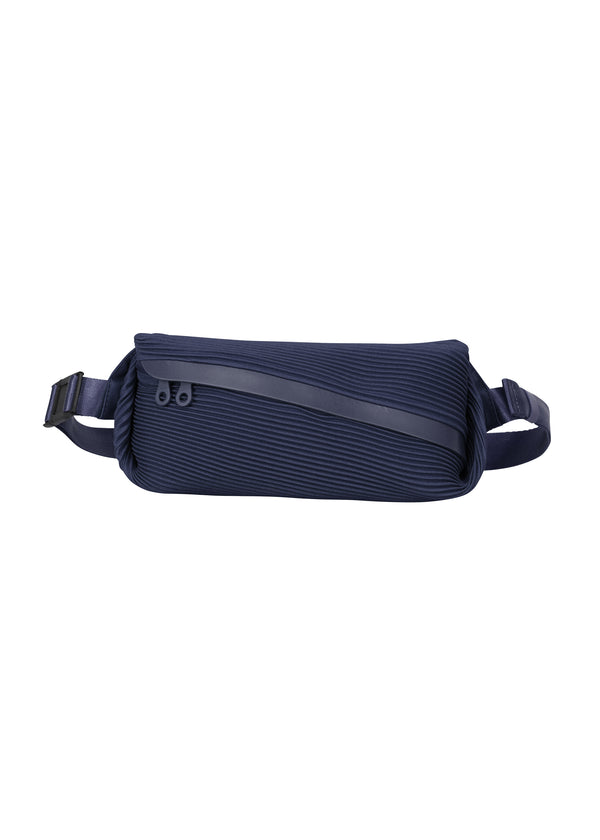 A product shot of the PLEATS PLEASE ISSEY MIYAKE  BIAS PLEATS WAISTBAG bag in navy (75)